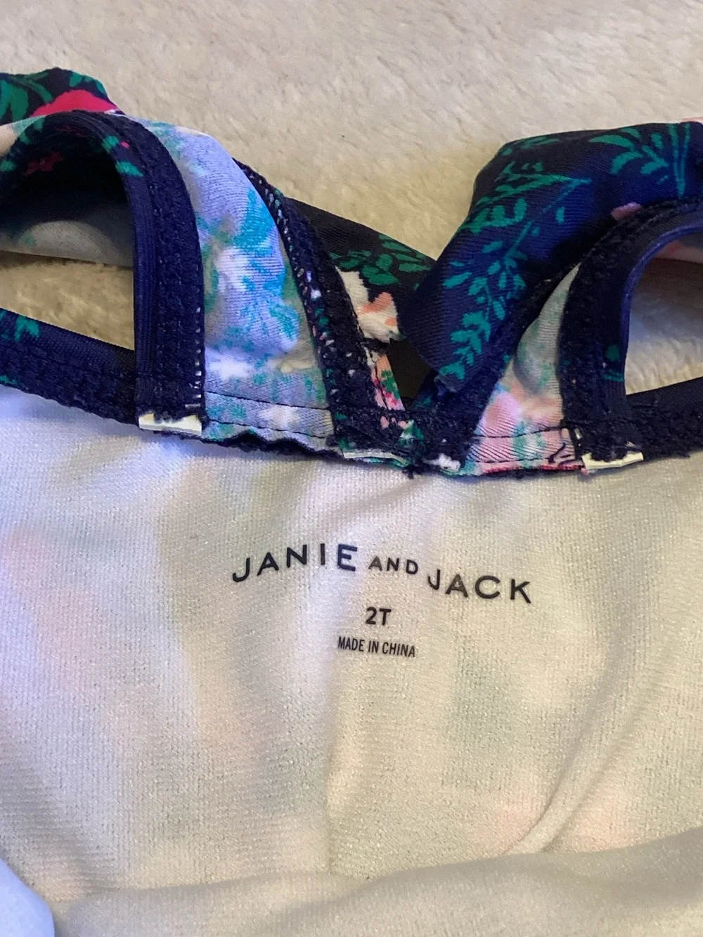 Janie and Jack Navy Floral One-Piece with Pink Bow Belt